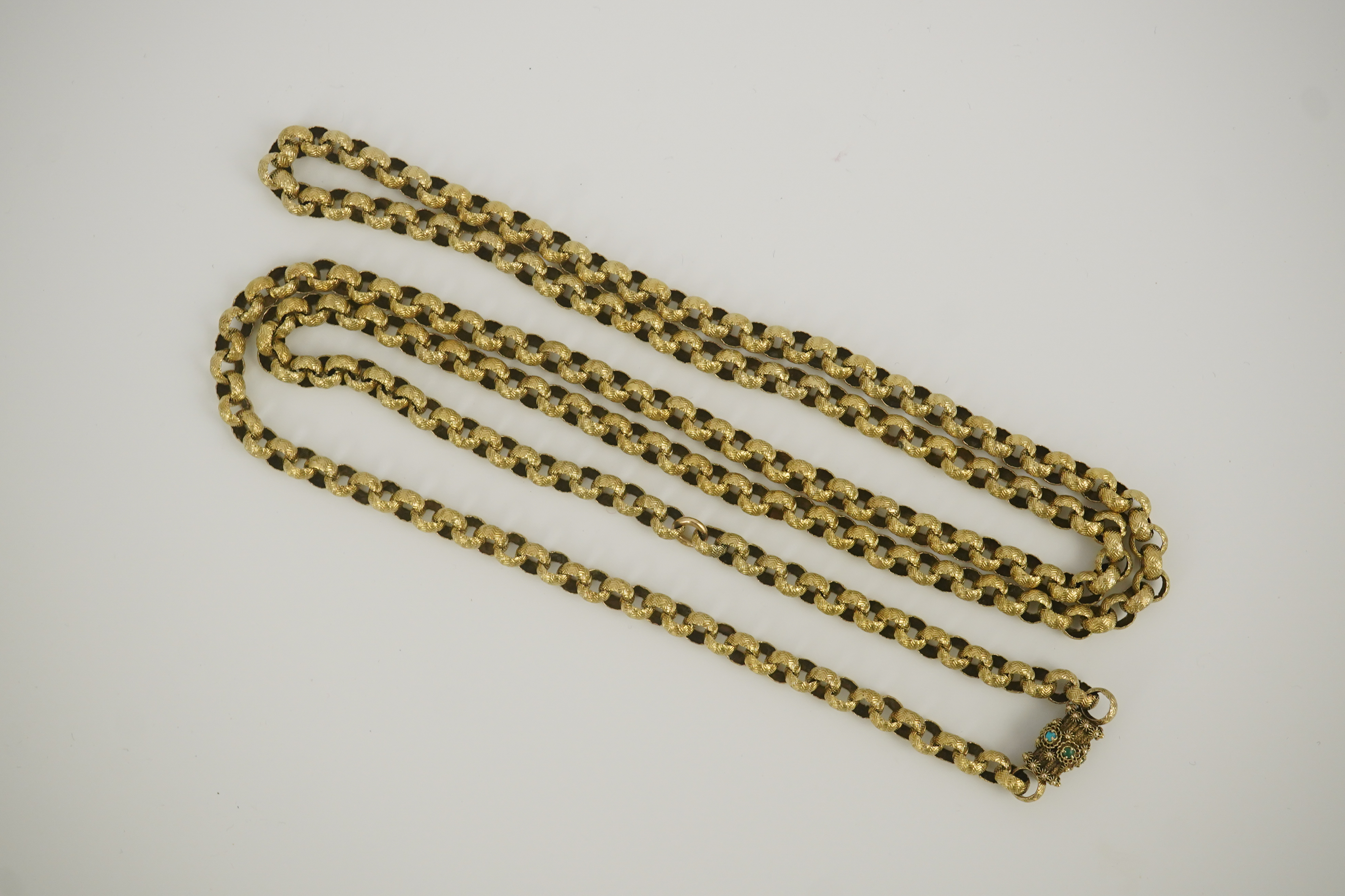 A Georgian gold textured circular link muff chain, with turquoise cluster set barrel shaped clasp